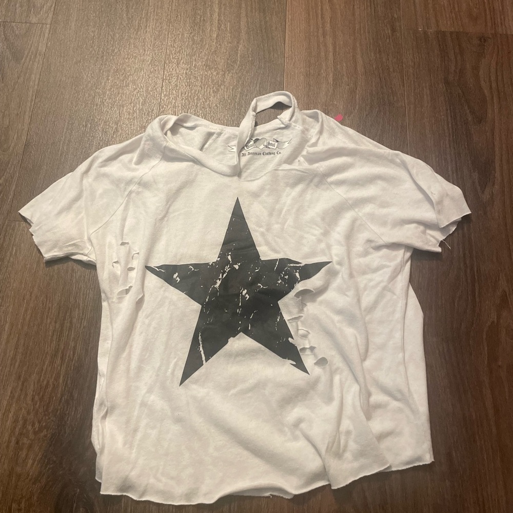 Distressed white t shirt with black star design print